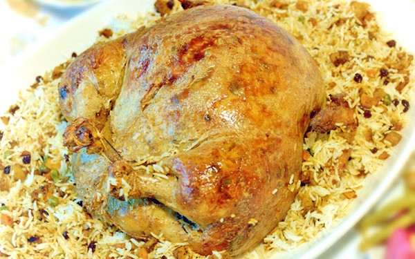 Roast chicken or turkey stuffed with rice (Dijaaj aw 'ali sheesh mahshi)