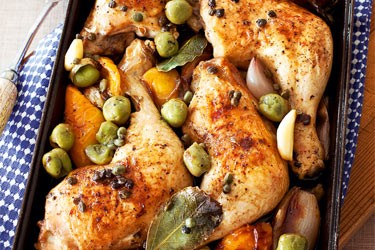 Roast chicken pieces with olives, garlic and lemon