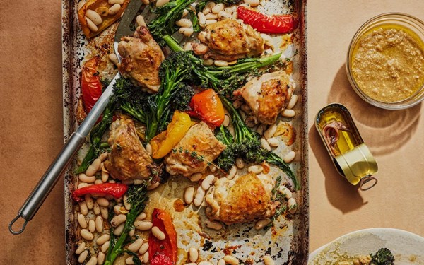 Roast chicken thighs, beans and broccoli with anchovy and almond pesto