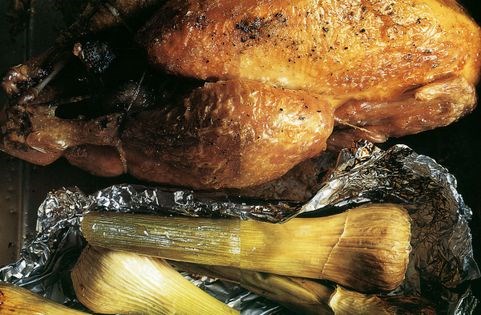 Roast chicken with baked garlic sauce