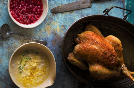 Roast chicken with bread and thyme leaf sauce and redcurrant sauce