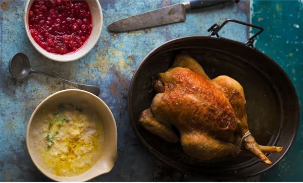 Roast chicken with bread and thyme leaf sauce and redcurrant sauce