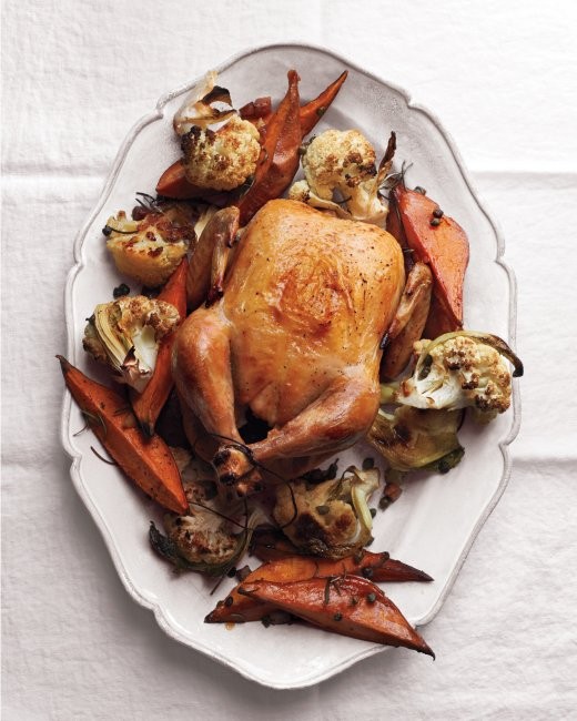 Roast chicken with cauliflower and sweet potatoes