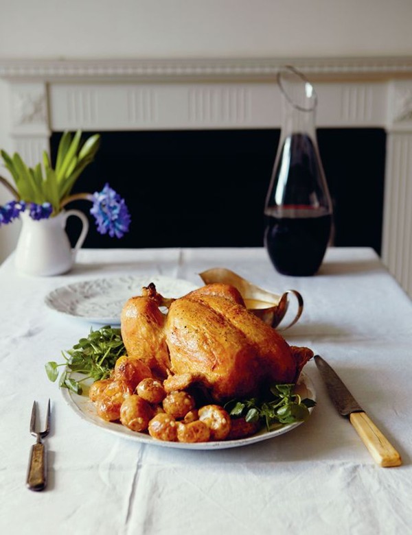 Roast chicken with crème fraîche, new potatoes and watercress