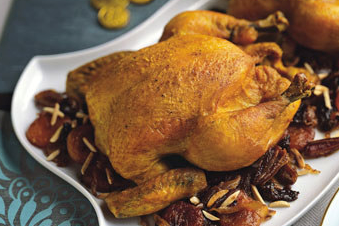 Roast chicken with dried fruit and almonds