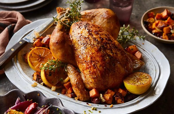 Roast chicken with fennel, sweet potato & black olive stuffing