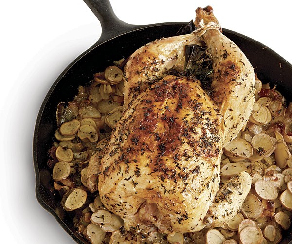 Roast chicken with fingerling potatoes, leeks, and bacon