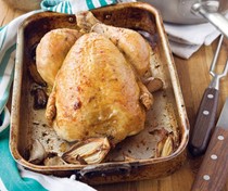 Roast chicken with fondant potato, minted peas and spinach