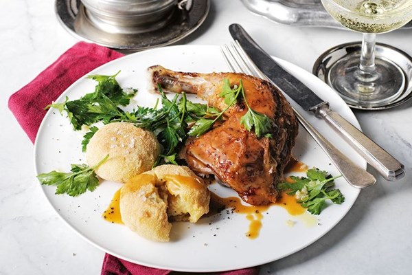 Roast chicken with garlic croquettes