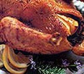 Roast chicken with lemon, garlic, and fresh rosemary