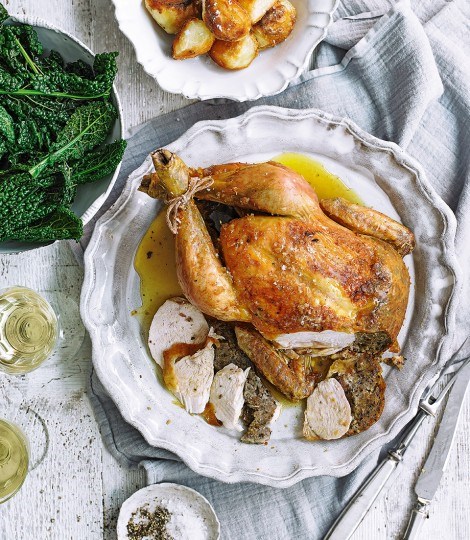 Roast chicken with lemon, oregano and olive breadcrumb stuffing