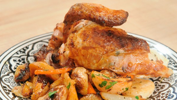 Roast chicken with preserved lemons and root vegetables