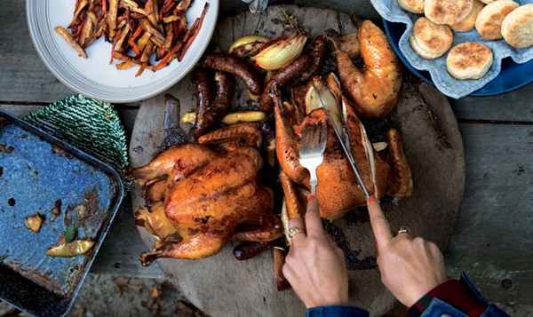 Roast chickens and sausages for a crowd