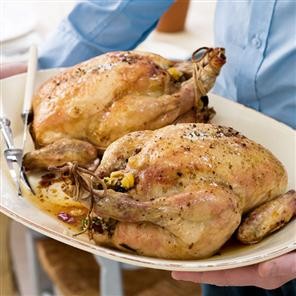 Roast chickens with a fragrant couscous stuffing