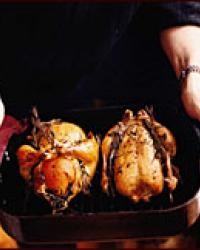 Roast chickens with lemon and orange