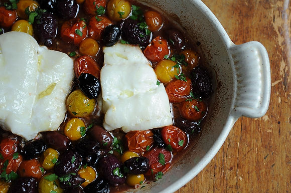 Roast cod with little tomatoes and assorted olives