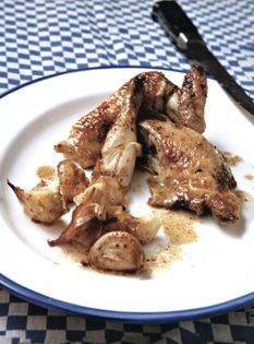 Roast coquelet, spatchcock-style with a sauce of tender young garlic