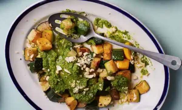 Roast courgettes with collard-peanut pesto