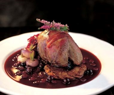 Roast crown of red grouse with beetroot and blackcurrant game gravy