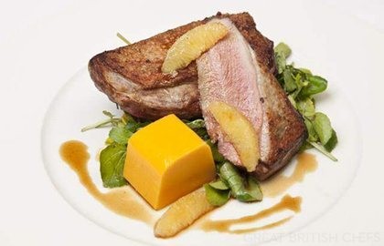 Roast duck crowns with wilted watercress, butternut squash mousse and bigarade sauce