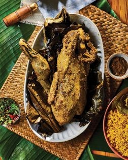 Roast duck in banana leaf (Bebek betutu)