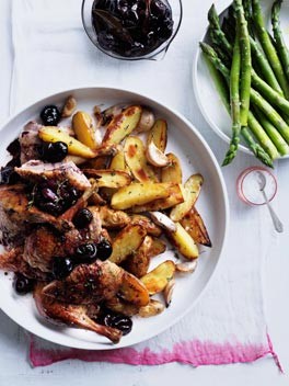 Roast duck with cherries and roast kipfler potatoes
