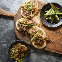 Roast duck with grilled cucumber and salad onion sauce