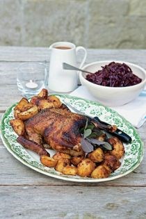 Roast duck with orange, star anise and cinnamon and roast potatoes