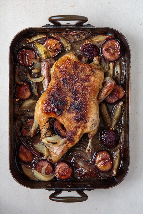 Roast duck with plums