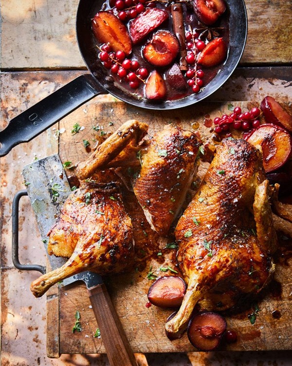Roast duck with plums and redcurrants