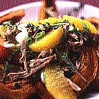 Roast duck with thyme- and orange-roasted pumpkin