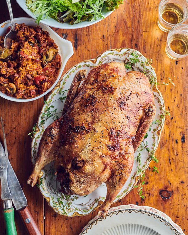 Roast duckling stuffed with oysters and red rice
