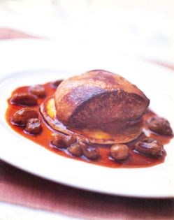 Roast foie gras on potato pancakes with macerated grapes