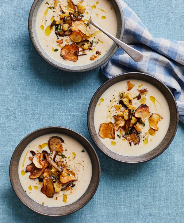 Roast garlic and almond soup with mushroom migas