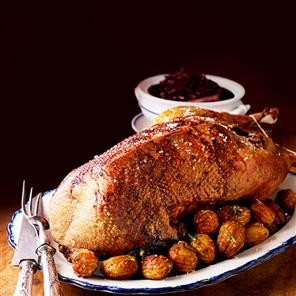 Roast goose stuffed with apples and prunes