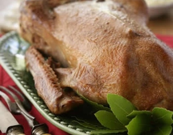 Roast goose with apple, onion and sage stuffing