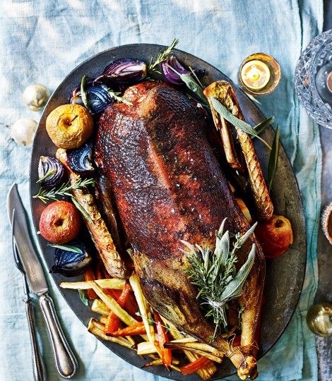 Roast goose with roast apples & onions and potato stuffing
