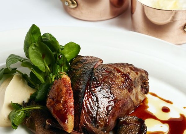 Roast grouse with game chips, watercress and bread sauce