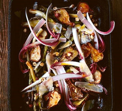Roast Jerusalem artichokes & leeks with crème fraîche, shaved Gouda & hazelnuts