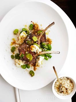 Roast lamb rack with spring onions, broad beans and goat's cheese