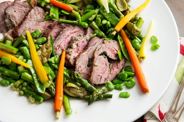 Roast lamb shoulder with spring vegetables