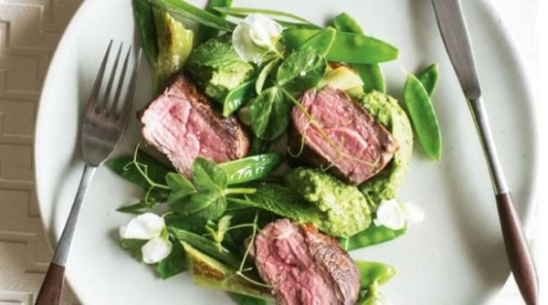 Roast lamb with pea and spring onion puree and snow peas