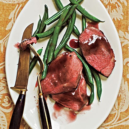 Roast lamb with pomegranate sauce