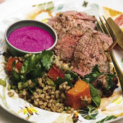 Roast lamb with warm barley salad and beetroot tahini