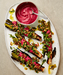 Roast leeks with beetroot tahini and hazelnut salsa