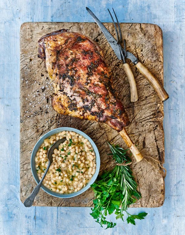 Roast leg of hogget, smashed white beans, anchovy, rosemary & parsley