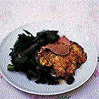 Roast leg of lamb marinated in saffron, lemon and yogurt