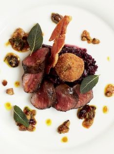 Roast loin of deer with haggis (Roast loin of deer with sticky red cabbage, crispy haggis and chestnut dressing)