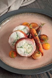 Roast loin of rabbit with roast baby carrots & shallots, hazelnut mousse, carrot & apricot purée