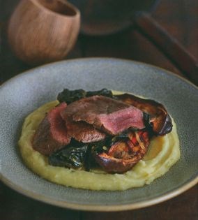 Roast ostrich on smoked mashed potatoes with moromi miso aubergines and apple-braised cavolo nero